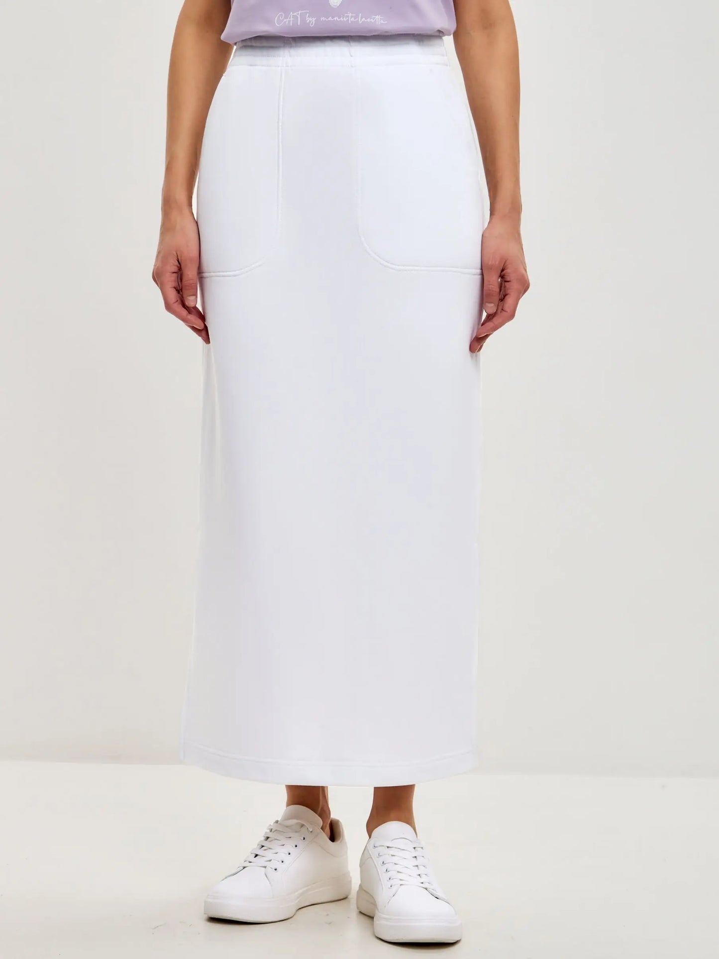 Set: women’s purple T-shirt with a white sport-casual skirt