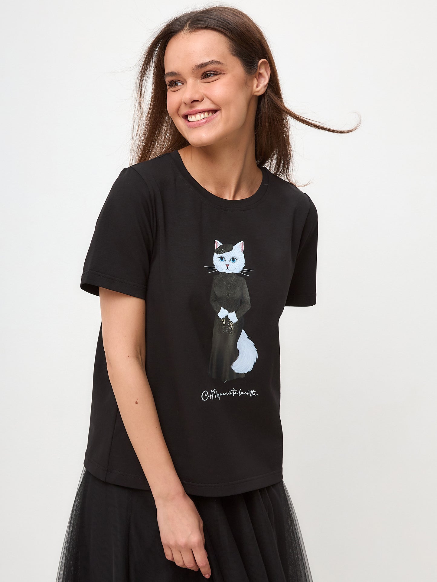 Elegance set: women's black T-shirt with a white cat and black mesh maxi skirt