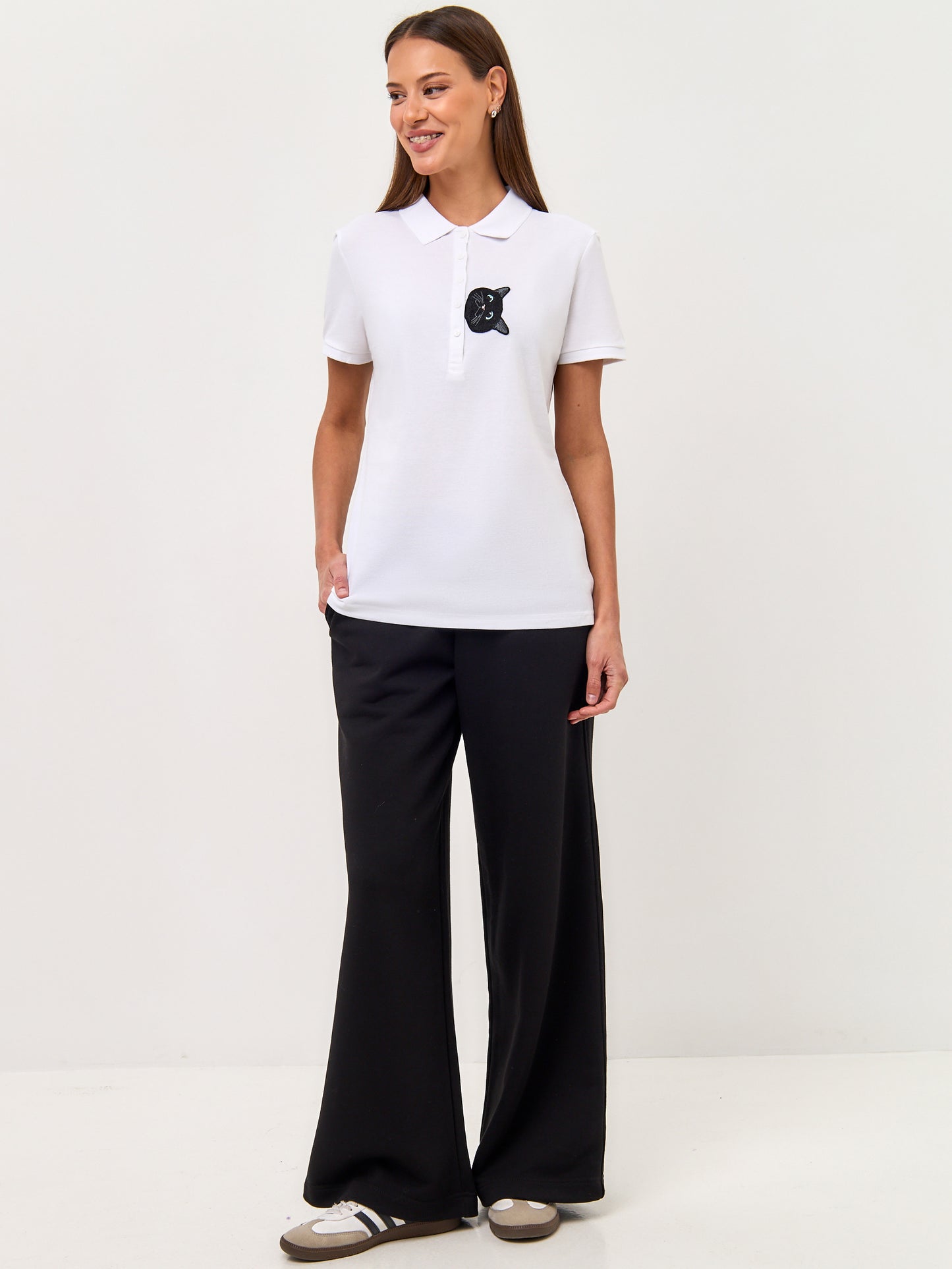 Set: women's white polo shirt with a black cat and black wide-leg sweatpants