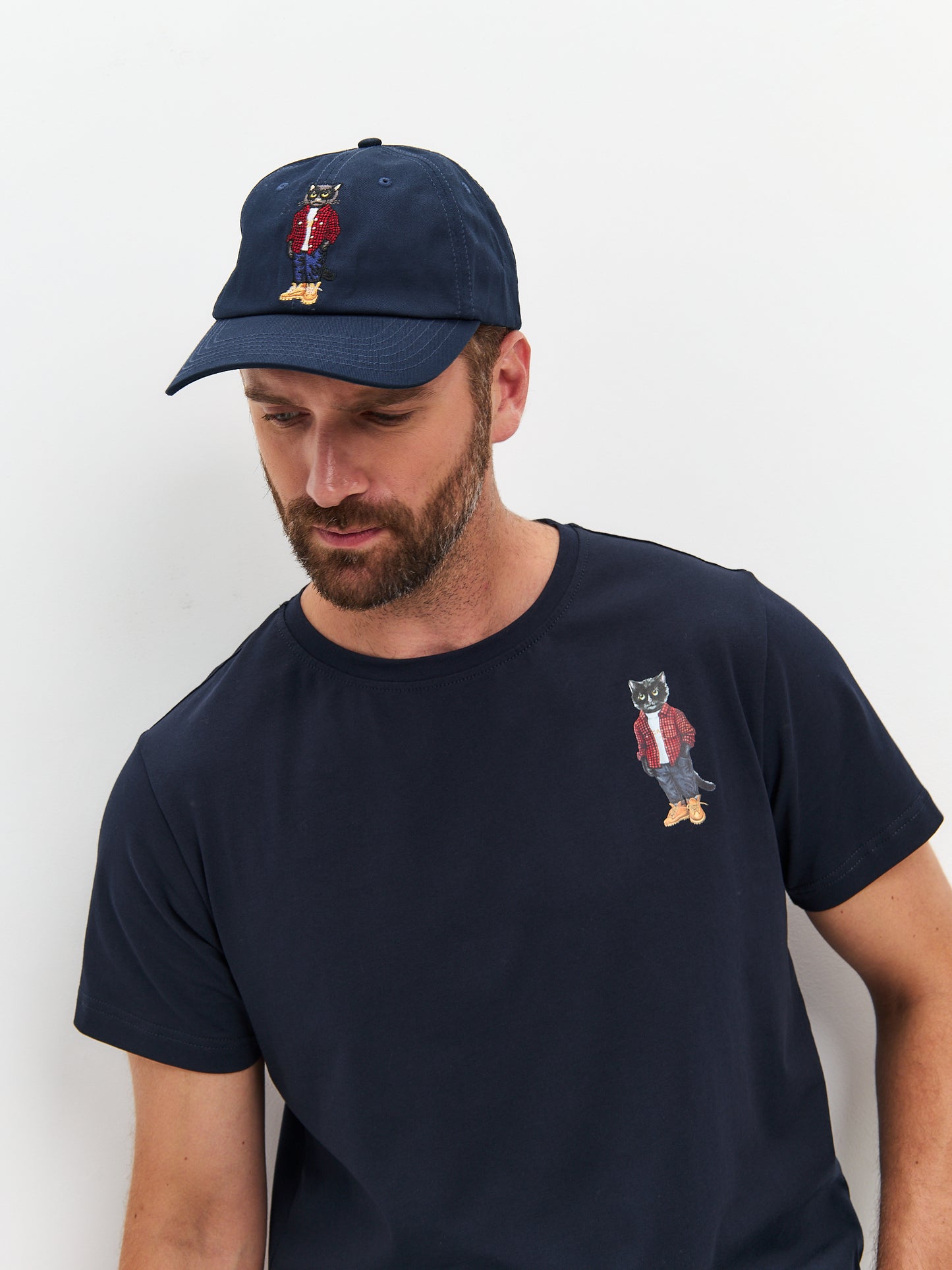 Set: men's blue T-shirt with a mini print of a black COUNTRY CAT and a dark blue cap with Cat embroidery