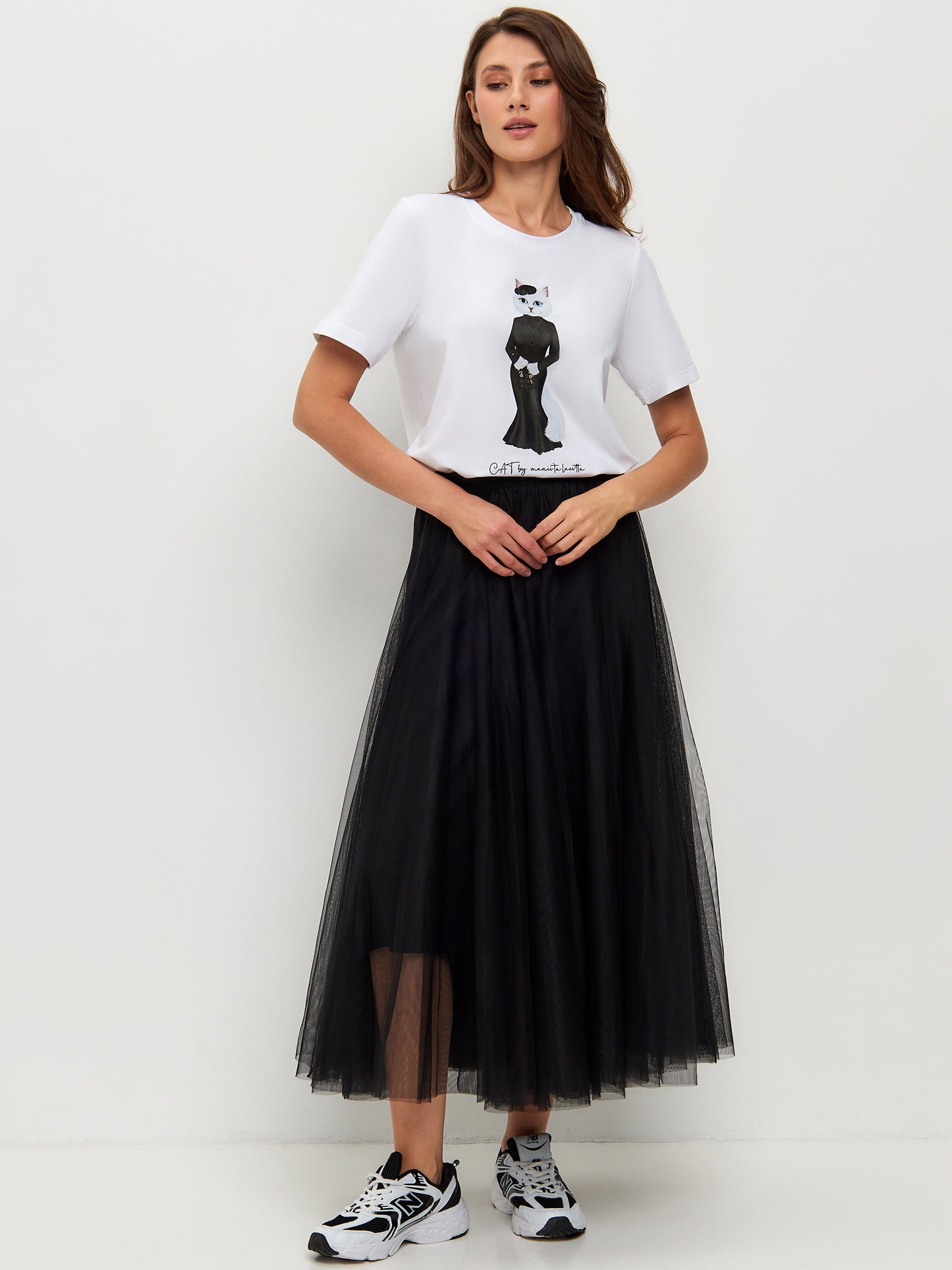 Set: women's white T-shirt with a white cat and black mesh skirt