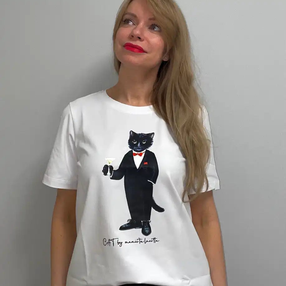 White t-shirt with cat graphic.